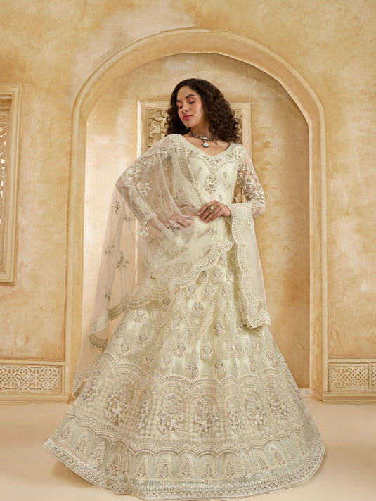 Ivory Net Lehenga Choli with Heavy Embroidery & Stonework