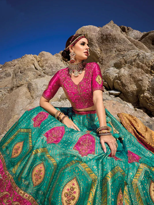 Elegant Teal and Pink Banarasi Silk Jacquard Lehenga with Dyeable Gajji Satin Blouse and Georgette Viscose Dupatta