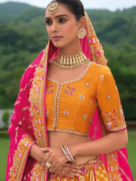 Mustard Yellow and Pink Lehenga with Traditional Patterns