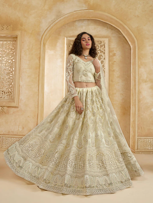 Ivory Net Lehenga Choli with Heavy Embroidery & Stonework