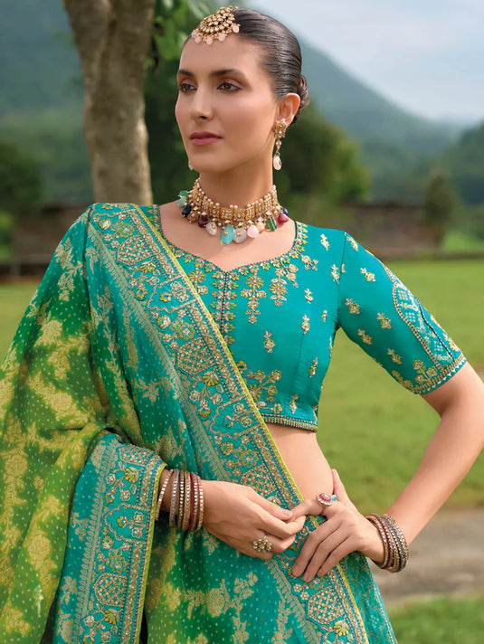 Turquoise Green Silk Lehenga with Heavily Embroidered Panels